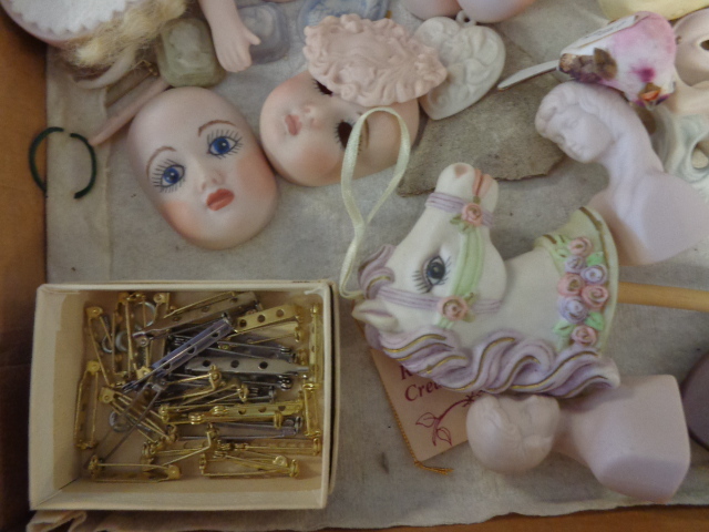 lot 37 image: Porcelain Doll parts and Accessories