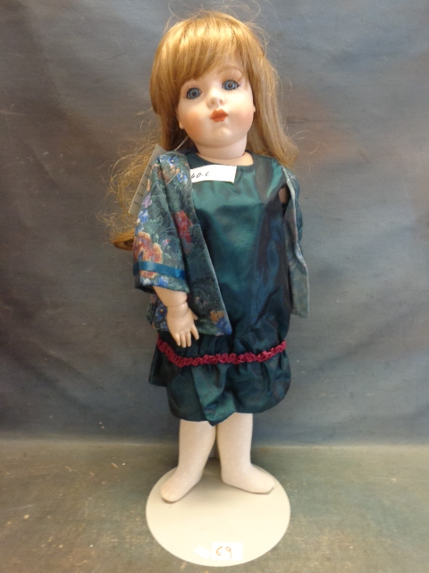 lot 69 image: Porcelain Doll