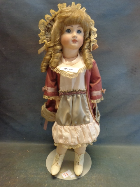 lot 71 image: Porcelain Doll