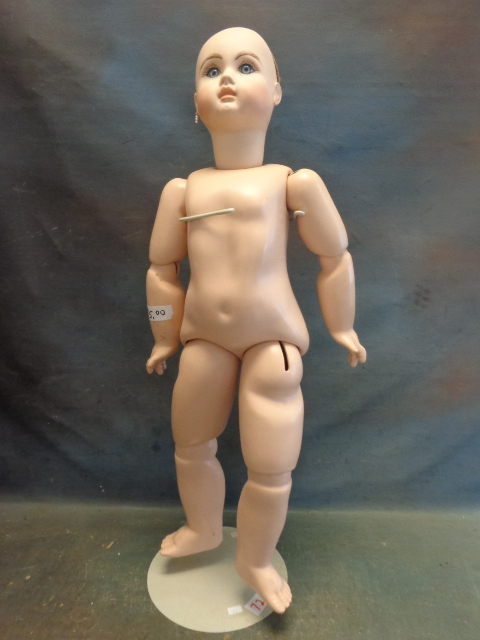 lot 72 image: Porcelain Doll