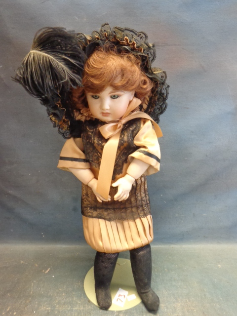 lot 73 image: Porcelain Doll