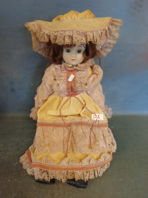 lot 102 image: Porcelain Doll