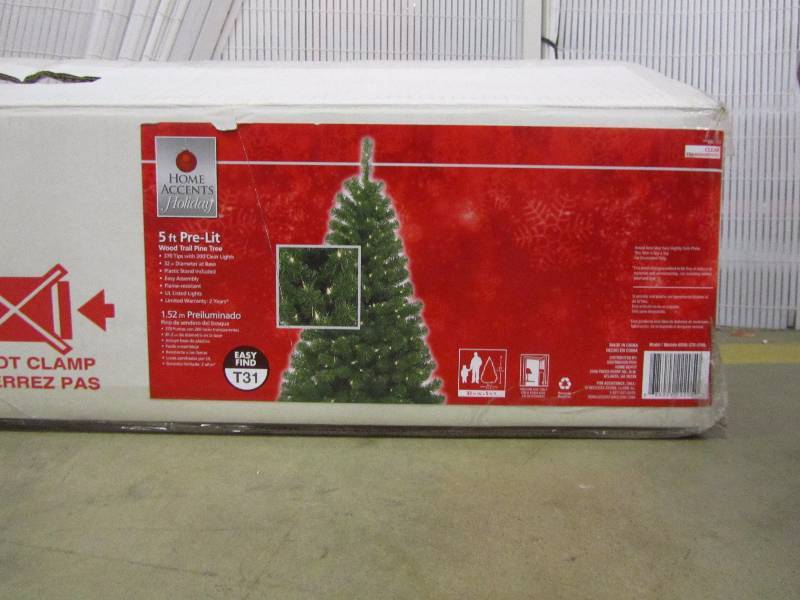 lot 15 image: Home Accents Holiday 5 ft. Wood Trail Pine Artificial Christmas Tree