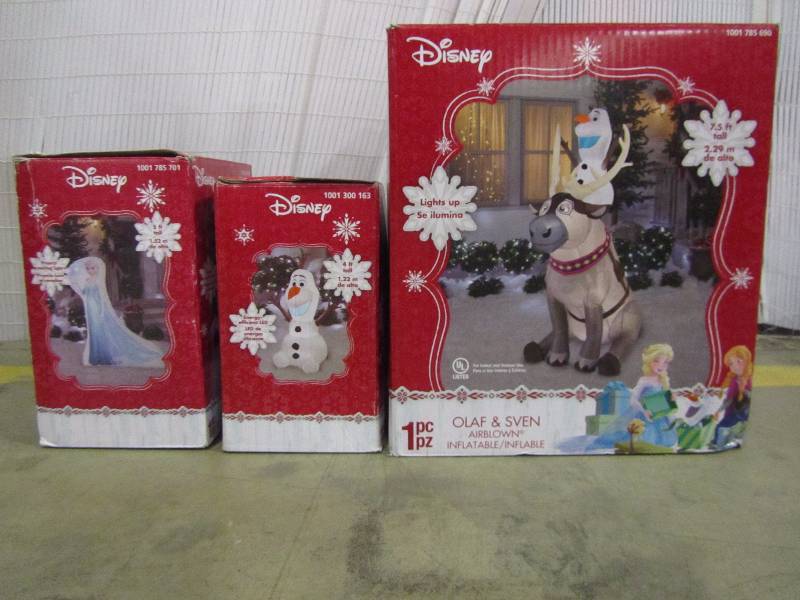 lot 24 image: Gemmy Disney Olaf Sitting on Sven Scene Home Accents Holiday 69.69 in. W x 20.87 in. D x 59.84 in. H Photorealistic Inflatable Elsa 42 in. Lighted Inflatable Olaf