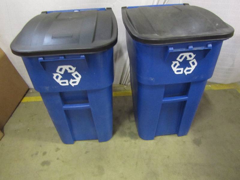 lot 44 image: Rubbermaid Commercial Products Brute 50 Gal. Blue Rollout Recycling Trash Container with Lid. quantity of 2