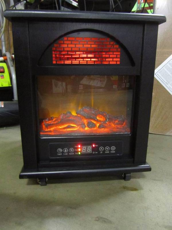 lot 57 image: 1500-Watt 4-Element Infrared Electric Portable Heater with Remote Control and Fireplace and Bluetooth Speaker