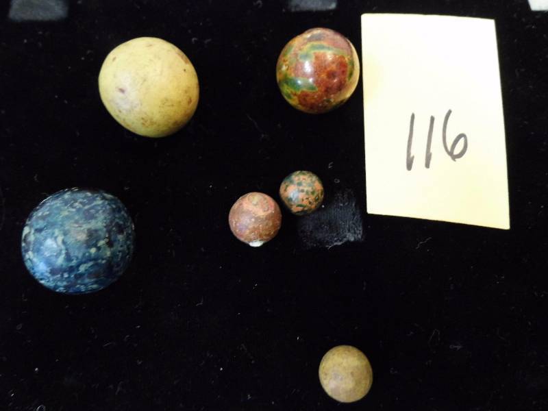 lot 116 image: Wooden Marbles.