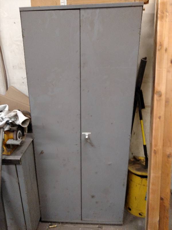 lot 9 image: 2 Door Cabinet, 36x19x85, Contents ...