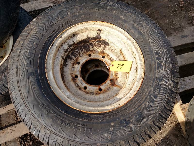 lot 79 image: (4) Bobcat S185 Wheels with LT 23585R16 Tires