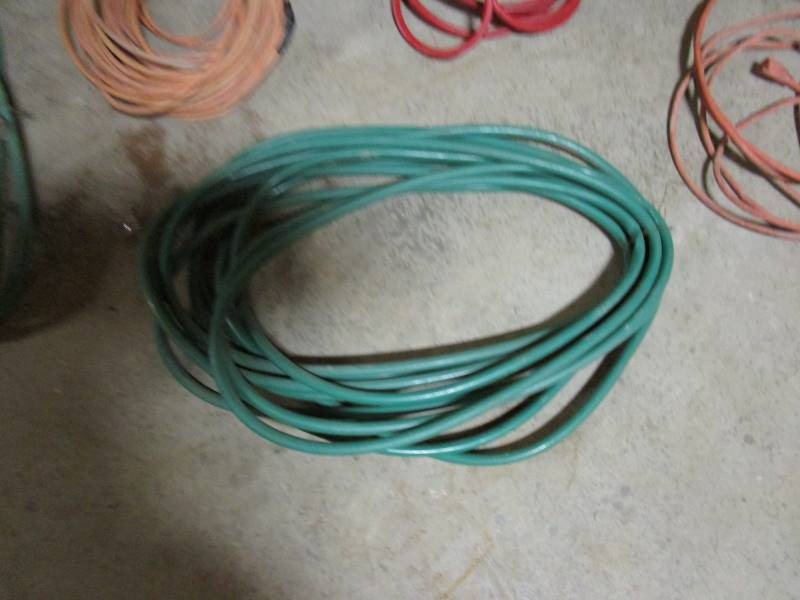 lot 84 image: Extension Chords, Air Hose, Water Hoses