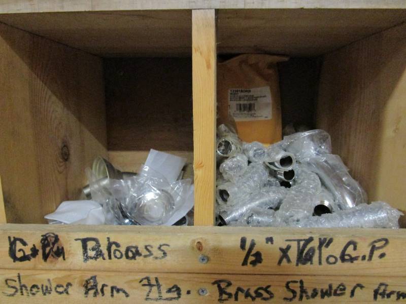 lot 114 image: 8x6x1 Wooden Wall Organizer  Contents (see pics)
