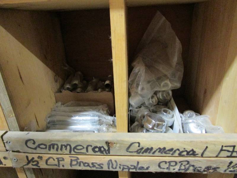 lot 115 image: 8x6x1 Wooden Wall Organizer  Contents (see pics)