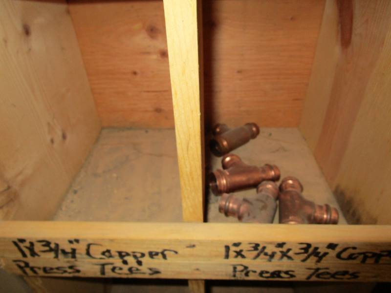 lot 117 image: 6x6x1 Wooden Wall Organizer  Contents (see pics)