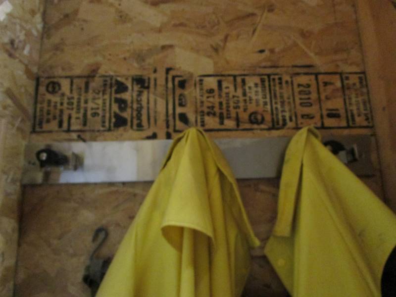 lot 153 image: Waders, Rain Gear, Broom Hanger