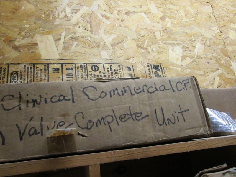 lot 122 image: 8x6x1 Wooden Wall Organizer  Contents (see pics)