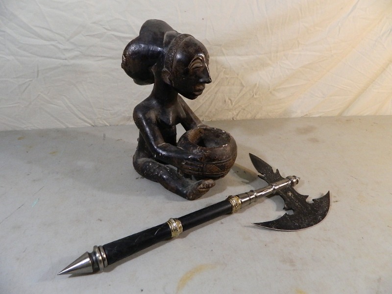 Heavy Statue and Ax