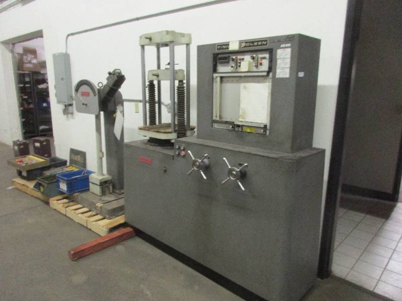 lot 12 image: Tinius Olsen Impact and Load Testing Machines