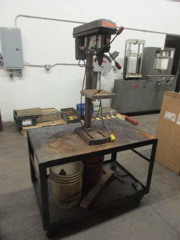 lot 16 image: Craftsman Drill Press on metal table