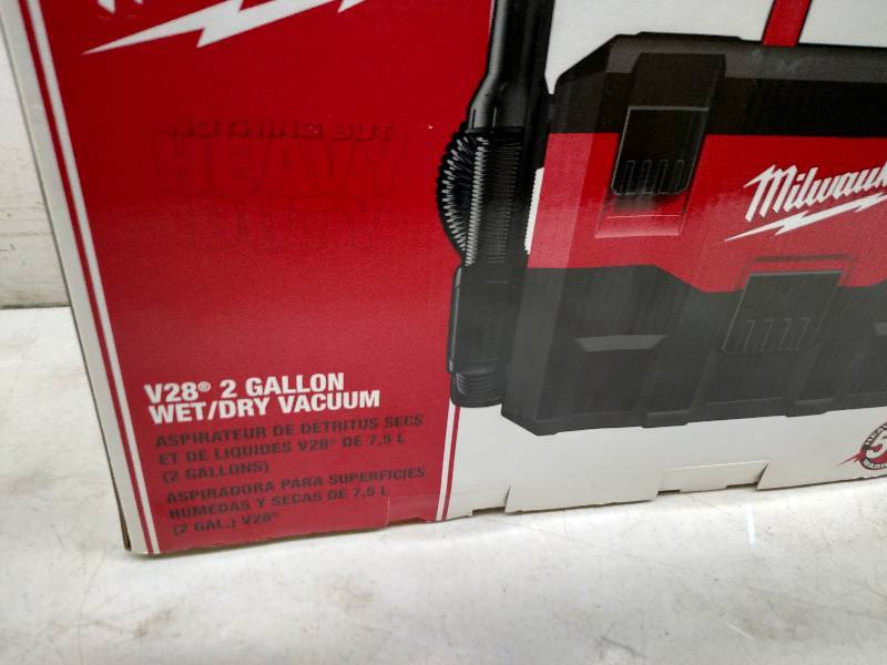 lot 55 image: Milwaukee Cordless 2 Gallon WetDry Vacuum