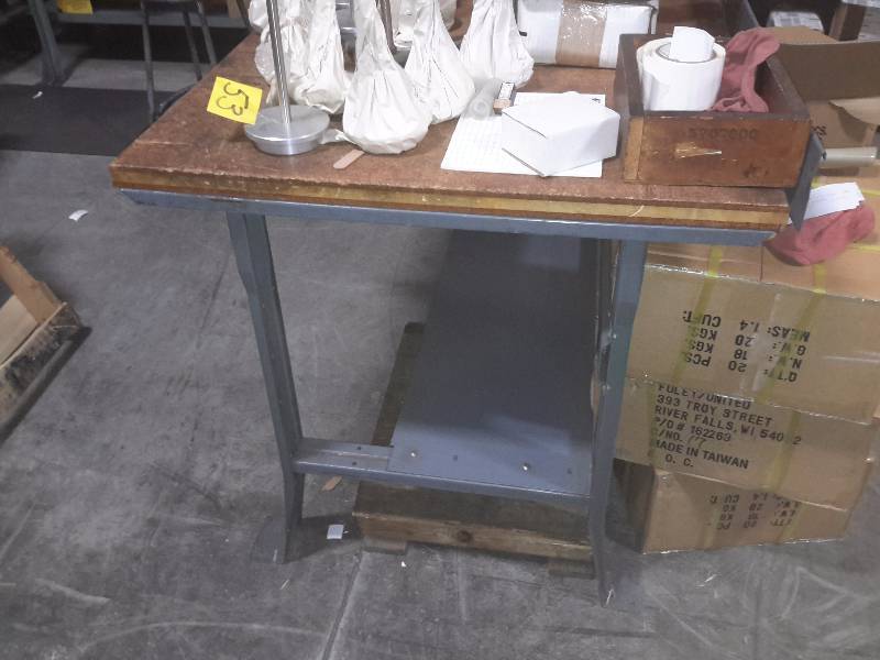 lot 31 image: Work table with steel baseshelf and wood top