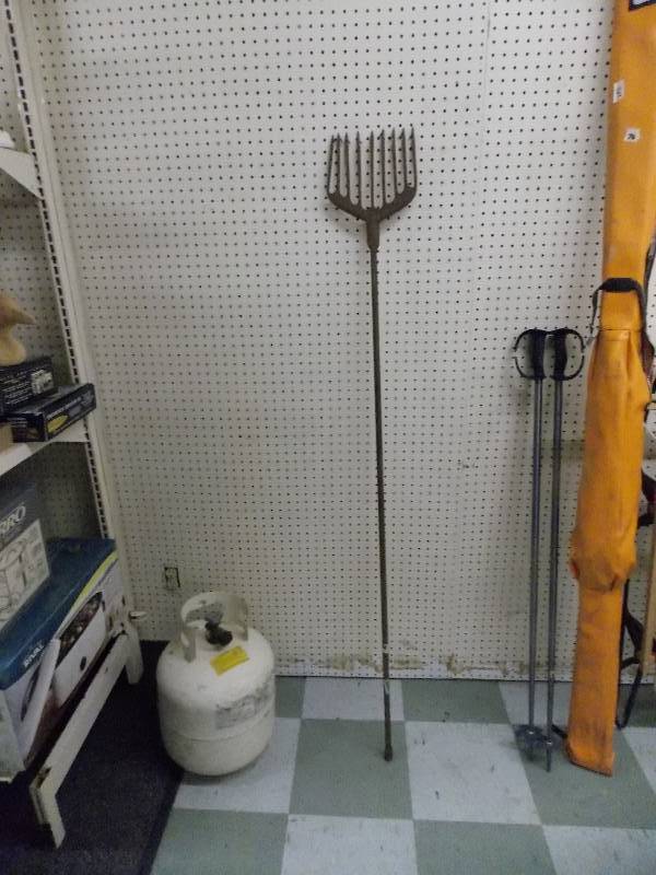 lot 78 image: 64 Ice Fishing Spear