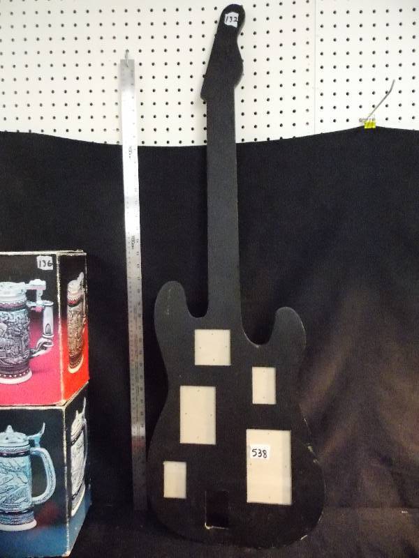 lot 132 image: Guitar Shaped Photo Wall Hanging