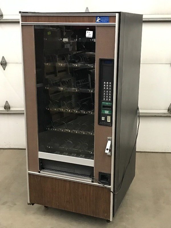 lot 1 image: Crane 148 Vending Machine