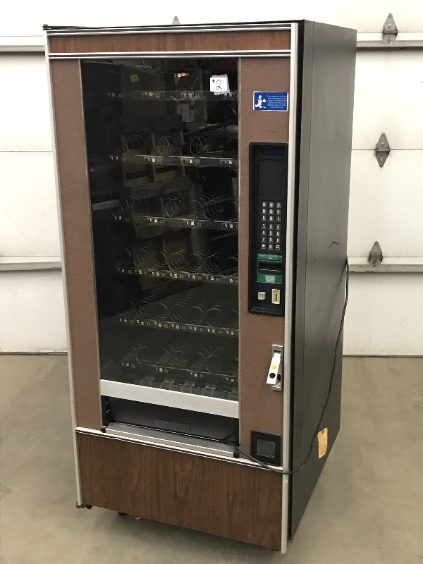 lot 2 image: Crane 148 Vending Machine