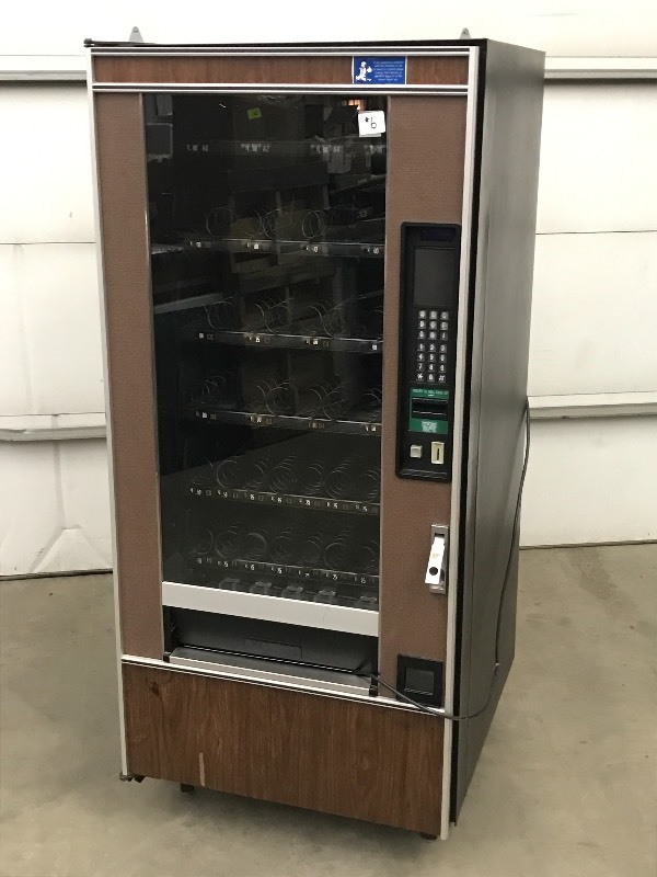 lot 6 image: Crane 148 Vending Machine
