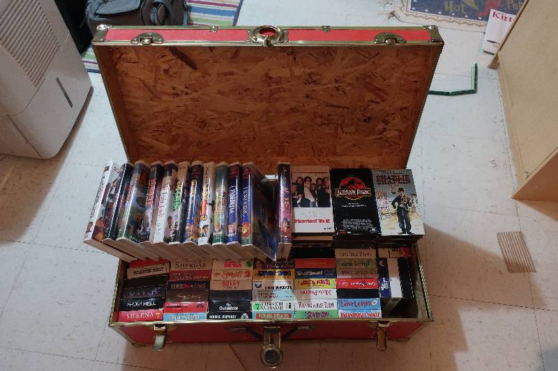 RED CHEST WITH VHS TAPES
