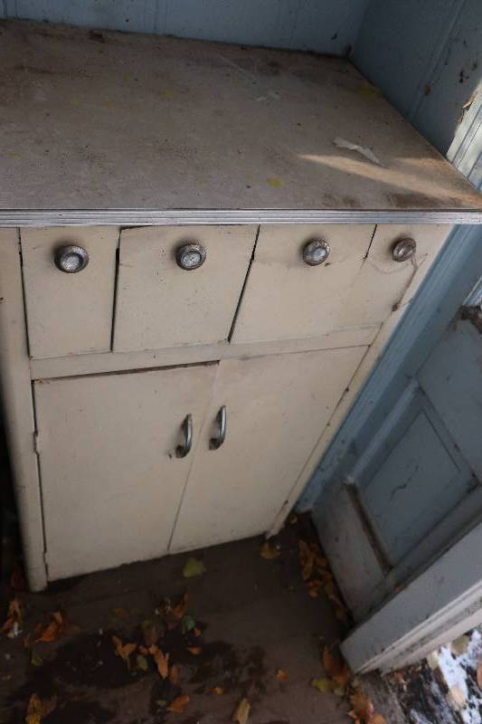 METAL CABINET IN CORNER