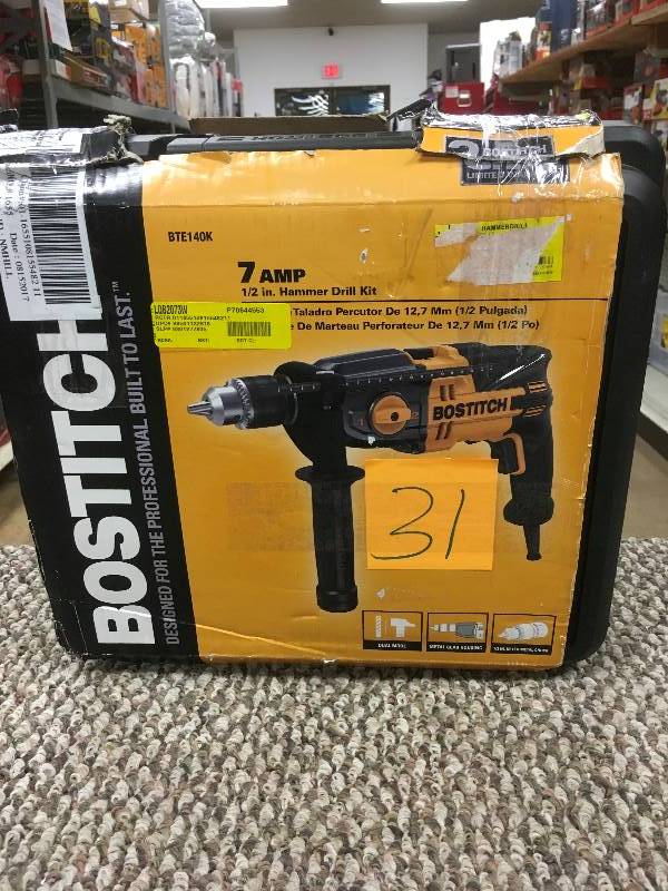 lot 31 image: USED - Bostitch 7 Amp 12 in. Hammer Drill Kit - USED