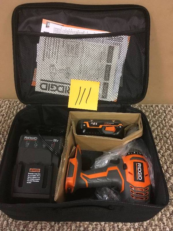 lot 111 image: Ridgid 18 Volt Lithium-Ion 12 in. Cordless Compact Driver Drill with Battery and Charger - Open Box never used