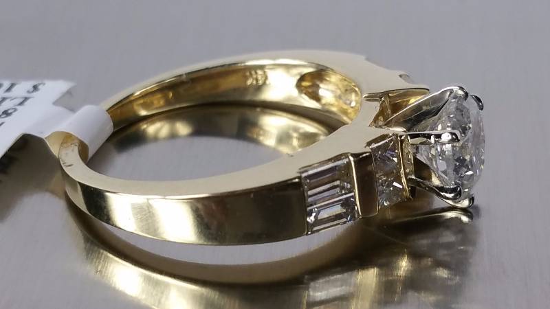 lot 15 image: Genuine Diamond Ring in 14k Gold - $16,135 Appraisal