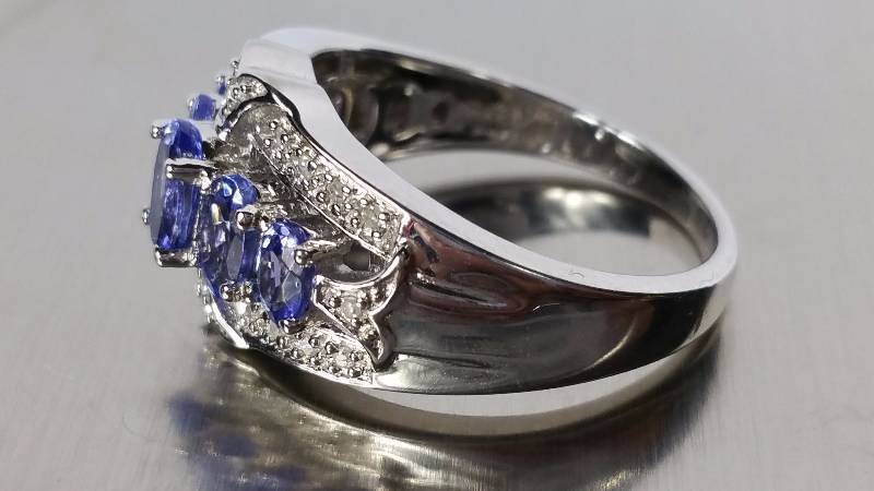 lot 101 image: Tanzanite and Diamond Ring