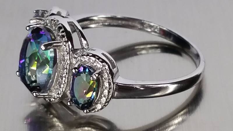 lot 134 image: Mystic Sapphire and Diamond Ring