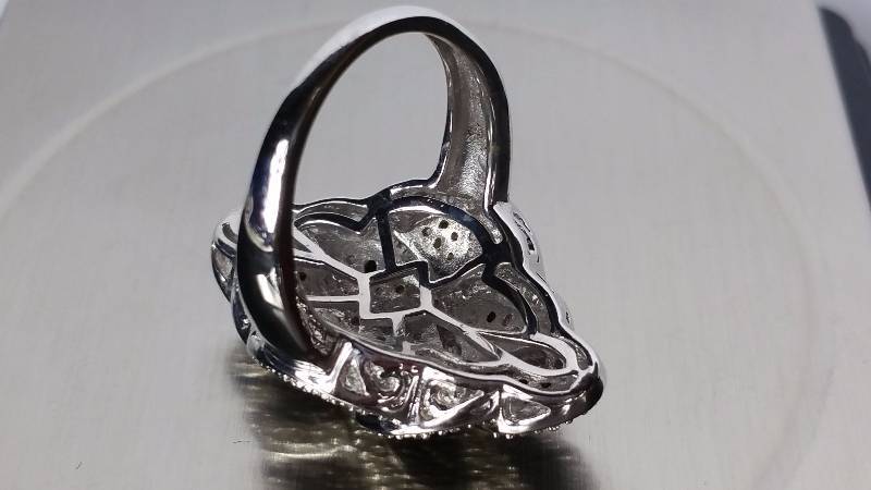 lot 136 image: Black and White Diamond Ring
