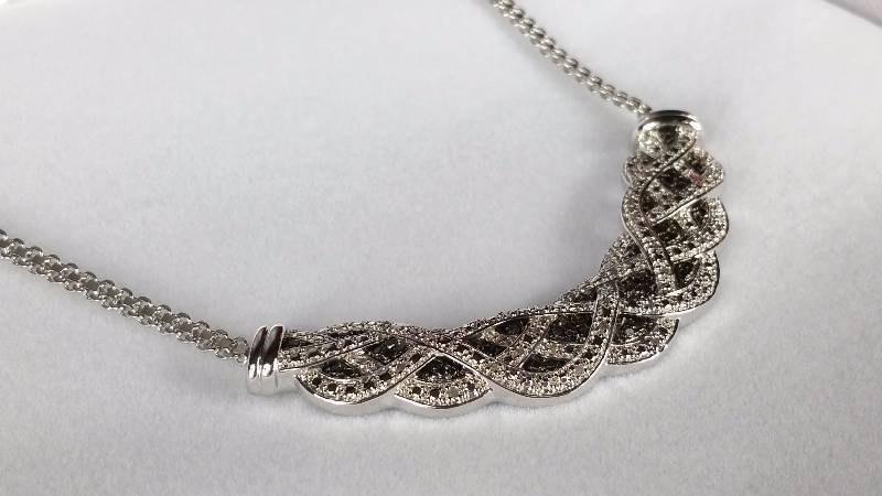 lot 137 image: Black and White Diamond Necklace