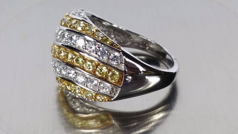 lot 163 image: Citrine and White Topaz Ring