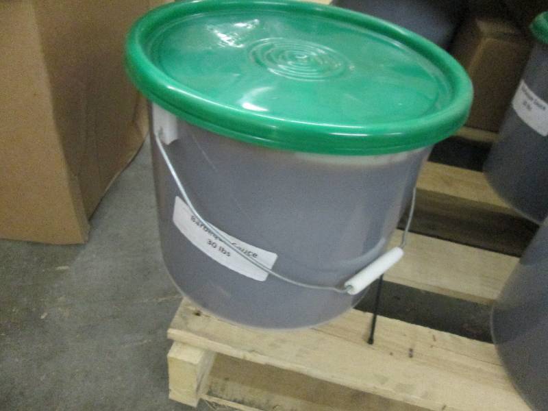 lot 142 image: 30 lbs Barbecue Sauce...