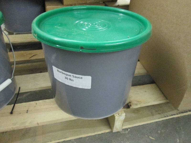lot 145 image: 30 lbs Barbecue Sauce...