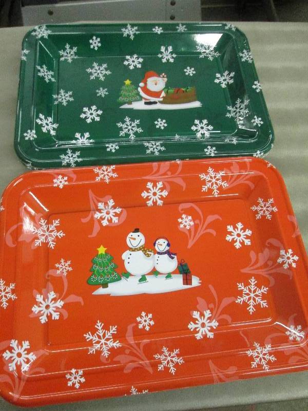 lot 205 image: Lot of 24 18x13 inch Plastic Holid...