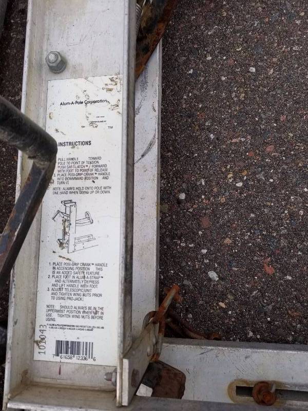 lot 26 image: Three aluminum pump jacks