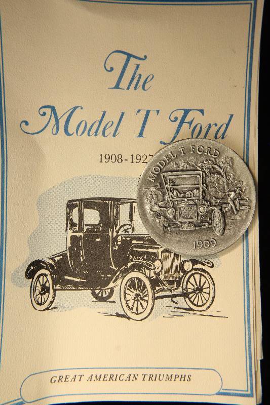 lot 55 image: VINTAGE MODEL T. FORD 1.04 TROY OZ. STERLING SILVER ART ROUND LONGINES SYMPHONETTE SOCIETY