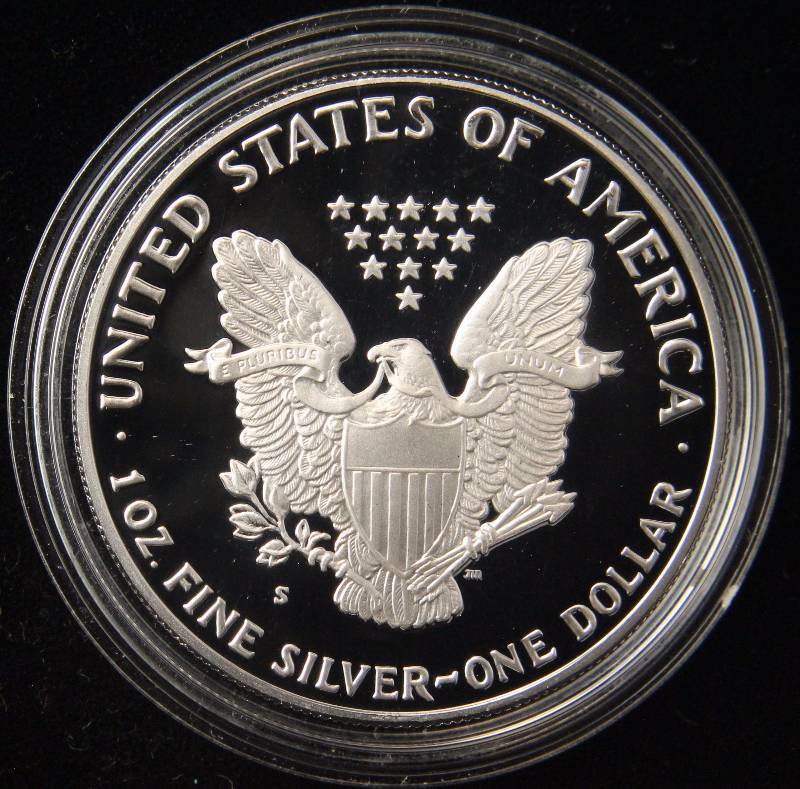 lot 69 image: 1990-S PROOF DCAM AMERICAN SILVER EAGLE 1 TROY OZ. .999 SILVER IN AIRTITE HOLDER