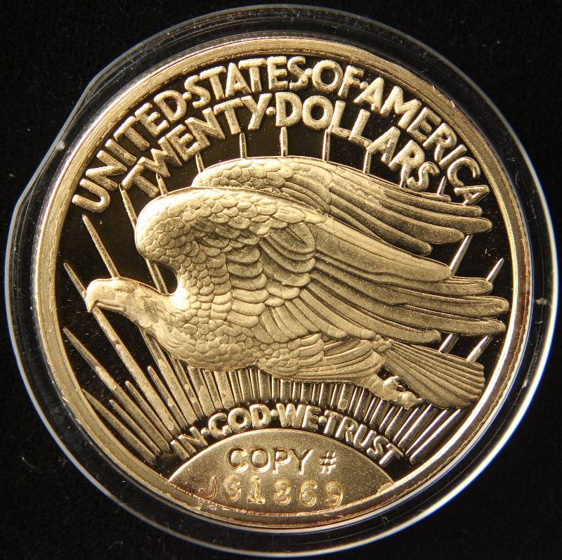 lot 68 image: 1 TROY OZ. .999 FINE SILVER SAINT GAUDENS DESIGN GOLD PLATED
