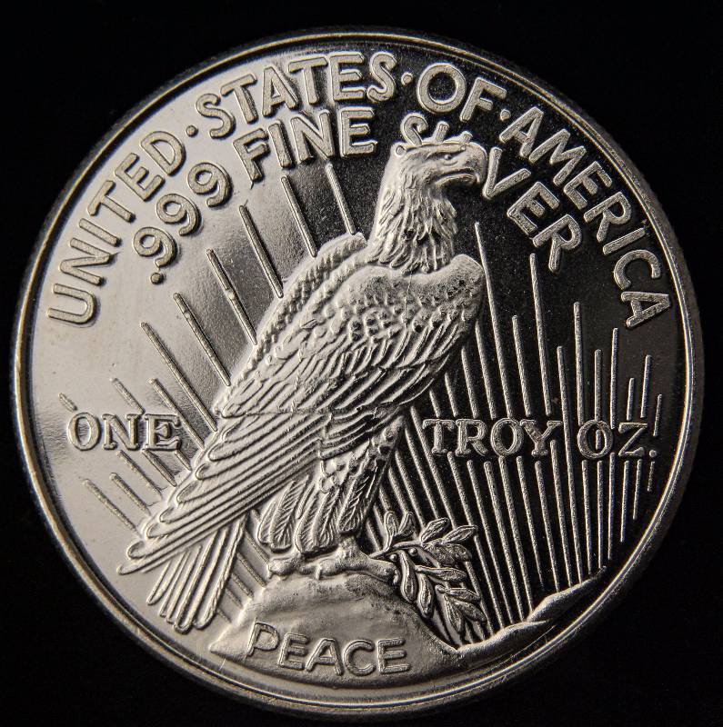 lot 12-A image: 1 TROY OZ. .999 FINE SILVER PEACE DOLLAR DESIGN