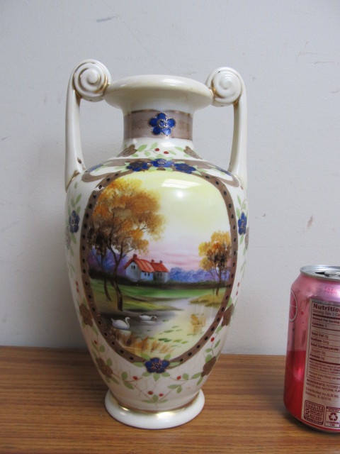 lot 48 image: Early Hand Painted Cottage Scene NORITAKE Handled Vase