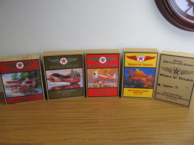 lot 98 image: Group of 5 WINGS OF TEXACO Diecast AirplanesBanks