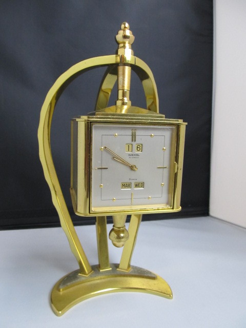 lot 68 image: Vintage Swiss IMEXAL 15 Jewel Rotating ClockHygrometerBarometer
